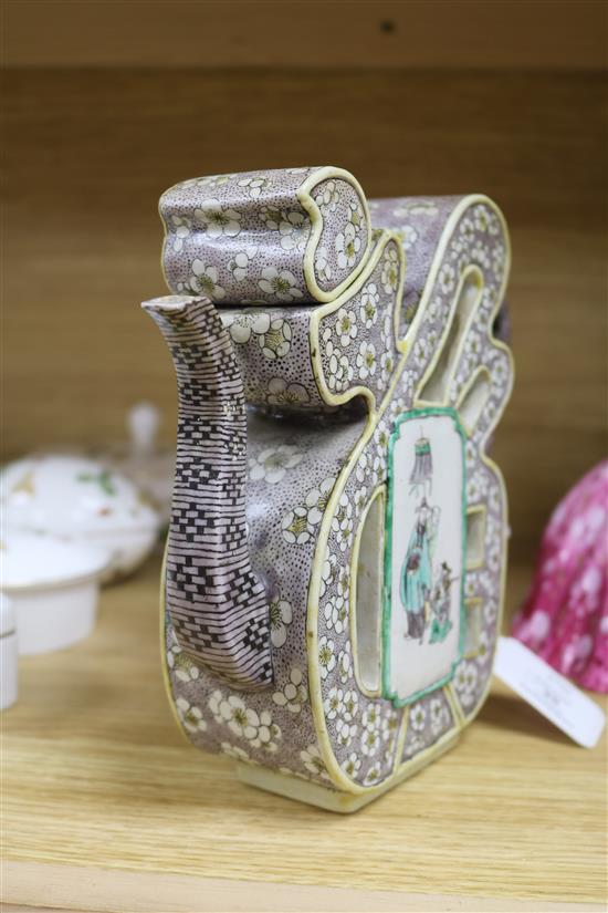 A 19th century Chinese enamelled biscuit Fu wine pot and cover, repaired